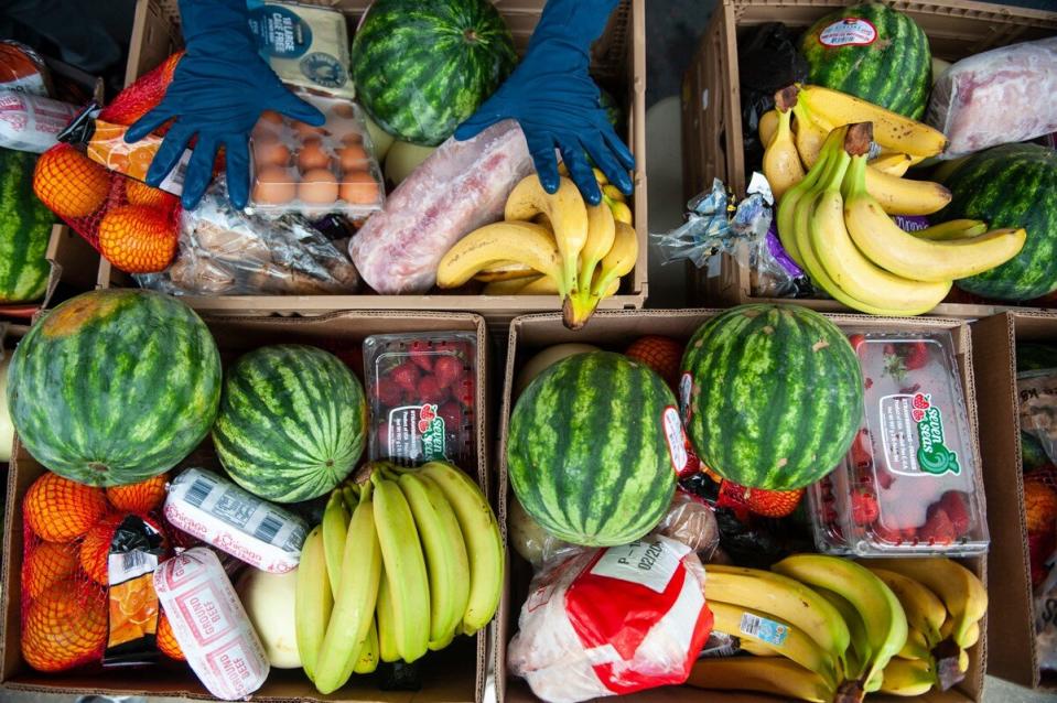 close up on produce boxes loaves &amp; fishes