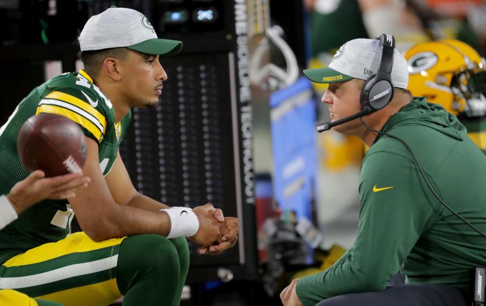 Green Bay Packers quarterback Jordan Love (10) talks with former quarterback coach Luke Getsy during a preseason game.