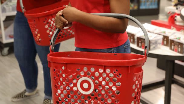 PHOTO: Employees holding shopping baskets prepare to open a Target Corp. store in the Queens borough of New York, Nov. 28, 2019. (Bloomberg via Getty Images, FILE)