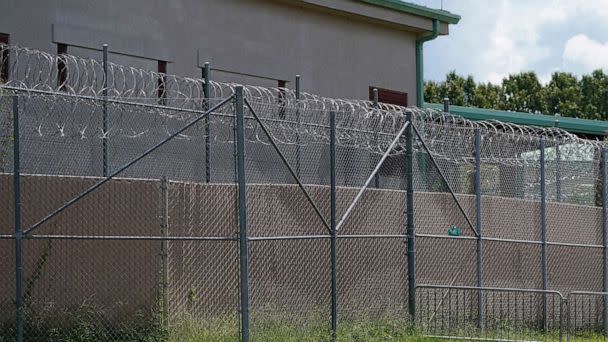 PHOTO: Rolls of razor wire line the top of the security fencing at the Raymond Detention Center in Raymond, Miss., on Aug. 1, 2022. (Rogelio V. Solis/AP, FILE)