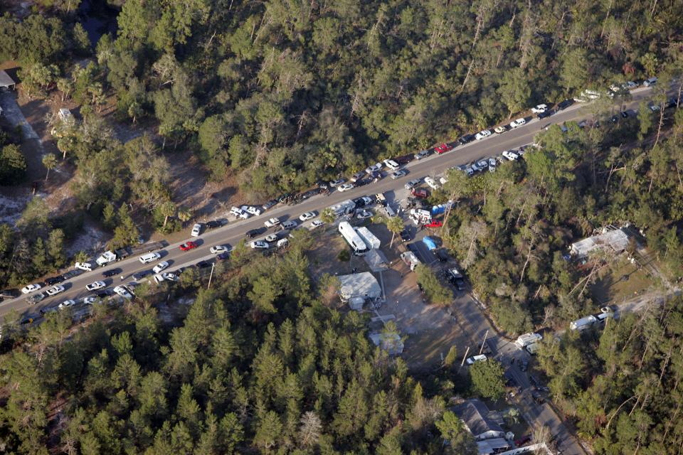 Hundreds of law enforcement officers search the area for Jason Lee Wheeler in the area around County Road 42 in Paisley, Fla. on Wednesday, February 9, 2005. Wheeler shot and killed Lake County Sheriff's Office Deputy Wayne Koester and wounded two other deputies in Paisley, Fla. on Wednesday morning.