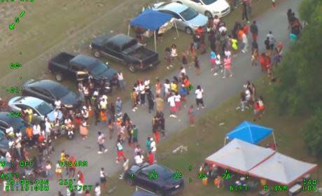 Crowds can be seen attending a block party in DeLand Saturday, May 16, 2020, that spilled into other neighborhoods.