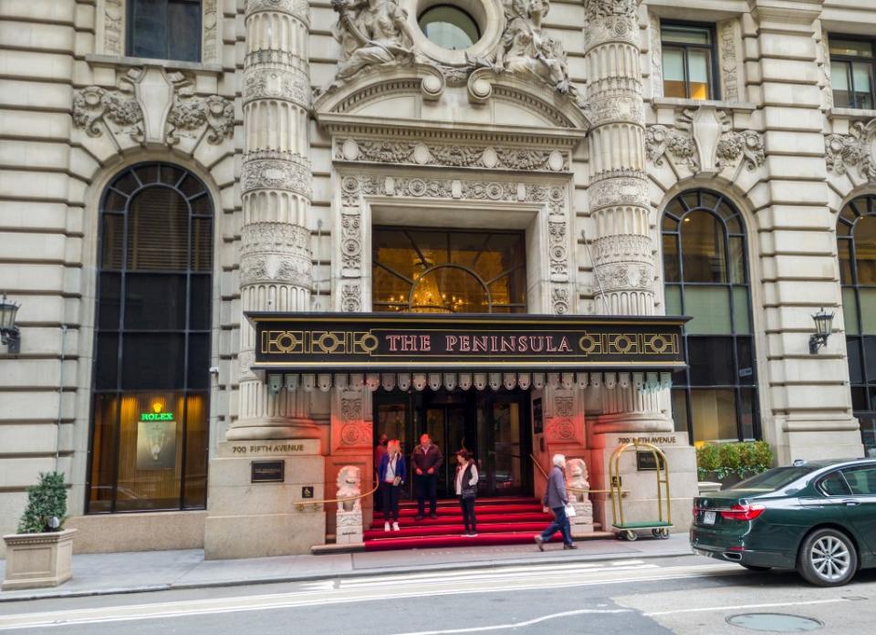 The Peninsula Hotel entrance off Fifth Avenue via Getty Images