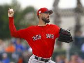 Mar 20, 2019; Sarasota, FL, USA; Boston Red Sox starting pitcher Rick Porcello (22) throws a pitch during the first against the Baltimore Orioles inning of a game at Ed Smith Stadium. Mandatory Credit: Butch Dill-USA TODAY Sports
