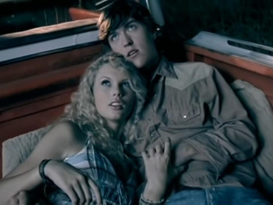 Taylor Swift and Clayton Collins in the music video for "Tim McGraw."