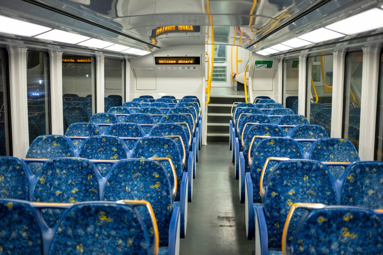 Inside Sydney train carriage with empty seats