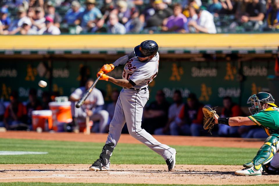 Detroit Tigers' Harold Castro hits a double against the Oakland Athletics during the second inning of the second baseball game of a doubleheader in Oakland, Calif., Thursday, July 21, 2022.