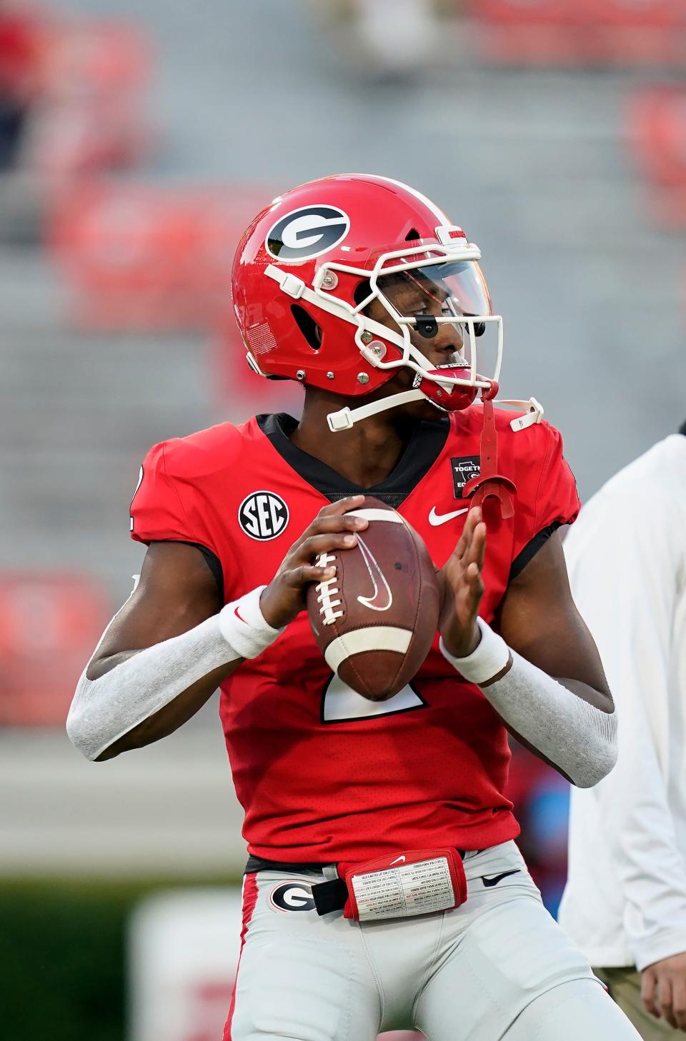 Georgia quarterback D'Wan Mathis (2)sets back to pass before an NCAA college football game against Auburn, Saturday, Oct. 3, 2020, in Athens, Ga. (AP Photo/Brynn Anderson)