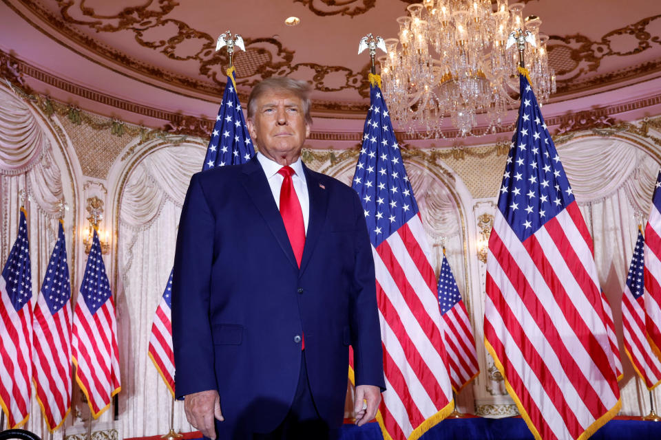 Former US President Donald Trump arrives onstage to announce that he will once again run for US president in the 2024 US presidential election, during an event at his Mar-a-Lago estate in Palm Beach, Florida, US November 15, 2022. REUTERS/ Jonathan Ernst