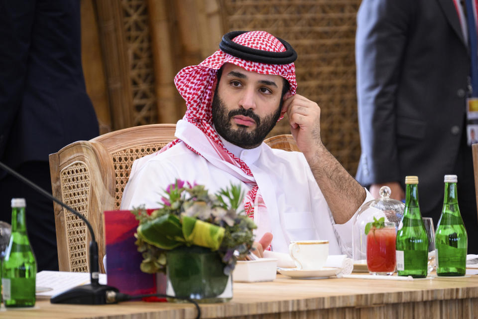 FILE - Crown Prince Mohammed bin Salman of Saudi Arabia takes his seat ahead of a working lunch at the G20 Summit, Tuesday, Nov. 15, 2022, in Nusa Dua, Bali, Indonesia. In the years since Saudi Crown Prince Mohammed bin Salman catapulted to power, it has been hard to find a controversy in the Middle East that doesn't somehow involve the 37-year-old heir to the throne. Now he's pivoting to his next audacious plan: Giving peace a chance. (Leon Neal/Pool Photo via AP, File)