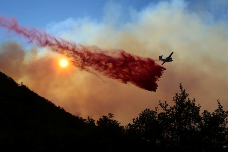 A wildfire dubbed the Cave Fire burns in the hills of Santa Barbara, California