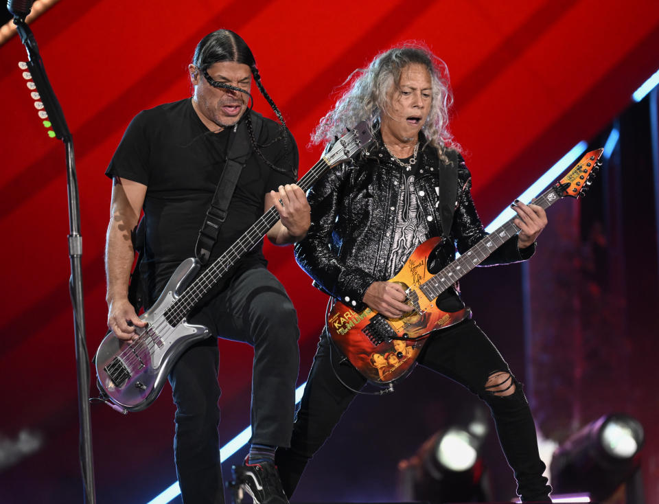 FILE - Robert Trujillo, left, and Kirk Hammett of Metallica perform during the Global Citizen Festival on Saturday, Sept. 24, 2022, at Central Park in New York. Metallica's latest album, "72 Seasons," releases Friday. (Photo by Evan Agostini/Invision/AP, File)