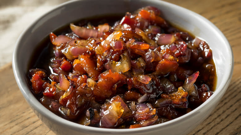 Bacon jam in white bowl