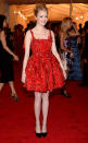 Emma Stone stood out in a sea of floor-length gowns thanks to her flirty red mini with sequined embellishments.