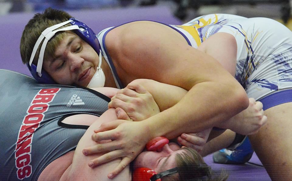 Watertown's Micah Hach makes quick work of Brookings' Dylan Reynolds at 285 pounds during an Eastern South Dakota Conference boys wrestling dual on Thursday, Dec. 14, 2023 in the Civic Arena.