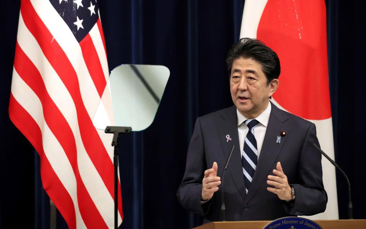 Shinzo Abe wants to have more foreign workers - EPA