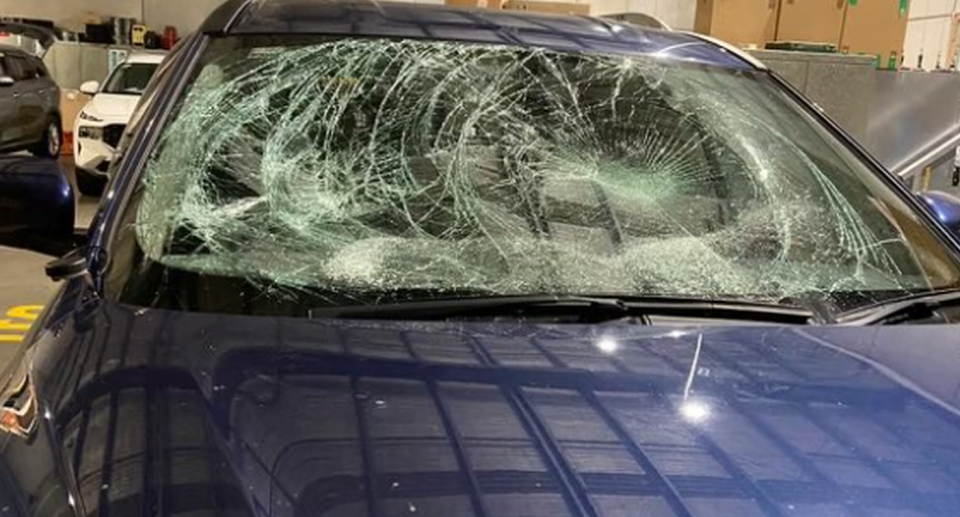 The car was left badly damaged after the alleged attack in Coburg, Melbourne. 
