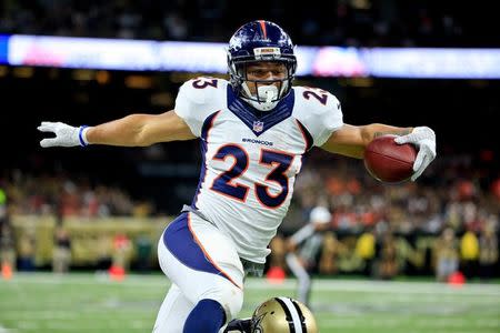 Nov 13, 2016; New Orleans, LA, USA; Denver Broncos running back Devontae Booker (23) runs against the New Orleans Saints during the second half of a game at the Mercedes-Benz Superdome. The Broncos defeated the Saints 25-23. Mandatory Credit: Derick E. Hingle-USA TODAY Sports