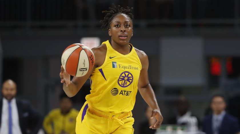 Los Angeles Sparks' Nneka Ogwumike advances the ball during the second half of a WNBA basketball game.