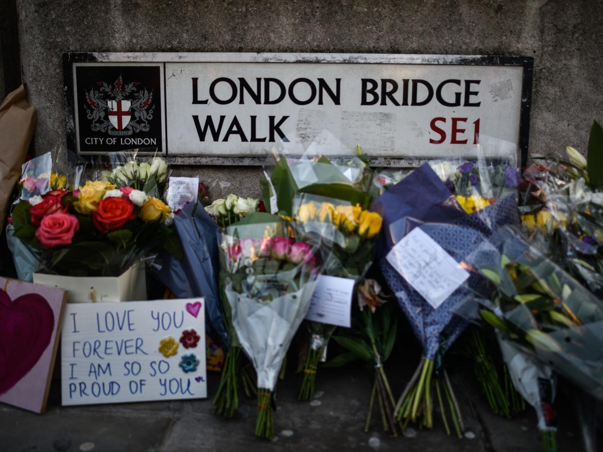 Floral tributes are left for Jack Merritt and Saskia Jones, who were killed in a terror attack on 29 November 2019 (Peter Summers/Getty Images)