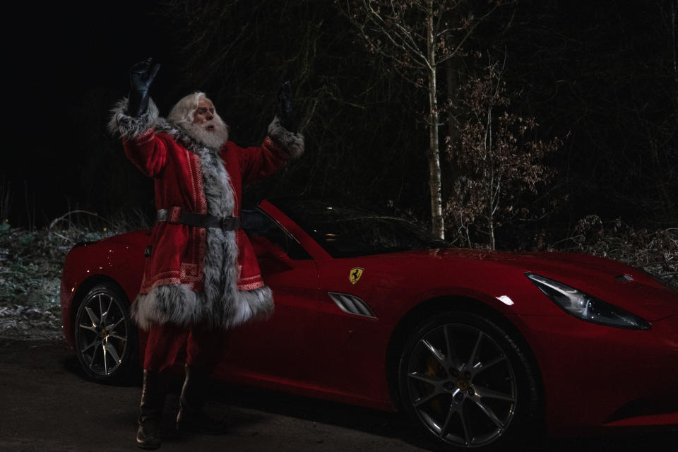 Timothy Spall as Santa with a sporty red car!