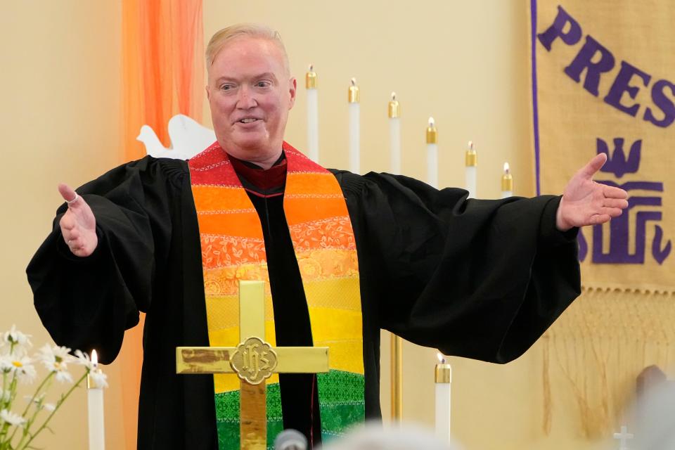 Jun 26, 2022; Pickerington, Ohio, USA;  Rev. Douglas Grace speaks after being ordained as the first LGBTQ pastor in Licking County and the first gay man ordained to a Presbyterian church in Greater Columbus during an ordination service at Prince of Peace Presbyterian Church in Pickerington on June 26, 2022.. Mandatory Credit: Adam Cairns-The Columbus Dispatch