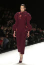 <b>Berlin Fashion Week</b>: A model walked the Leandro Cano show in a burgundy jumpsuit with 3d floral detail.<br><br>Image © Rex