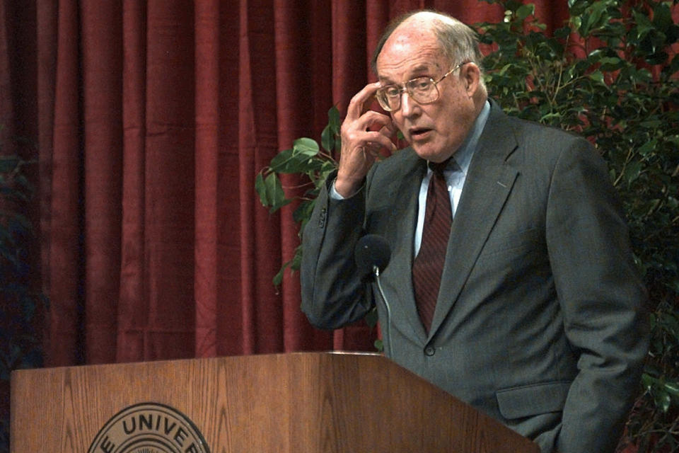 FILE - In this Sept. 18, 1998, file photo, Supreme Court Chief Justice William H. Rehnquist speaks during a lecture at Drake University in Des Moines, Iowa. In his 1992 book "Grand Inquests," Rehnquist detailed the House impeachment and Senate trial of President Andrew Johnson, who was impeached and forced to stand trial in the Senate, and those conducted in 1804 for Supreme Court Justice Samuel Chase. As House Democrats quickly move forward with impeachment proceedings against President Donald Trump, much remains unknown about how a Senate trial would a proceed, including what the charges would be. (AP Photo/Charlie Neibergall, File)