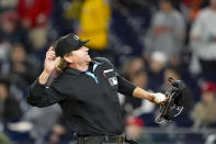 Home plate umpire Mike Muchlinski ejects Pittsburgh Pirates manager Derek Shelton during the seventh inning of the team's baseball game against the Washington Nationals at Nationals Park, Wednesday, April 3, 2024, in Washington. The Nationals won 5-3. (AP Photo/Alex Brandon)