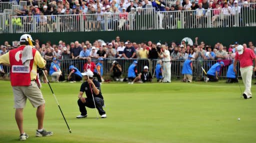 Adam Scott of Australia reacts after missing his putt to tie the championship on the 18th green during his final round on day four of the 2012 Open Championship at Royal Lytham and St Annes in Lytham. Ernie Els won the championship with a score of 273