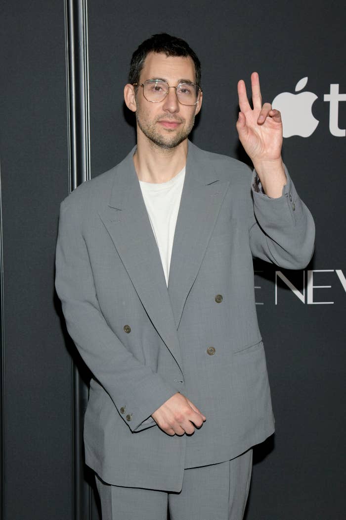 jack in a suit throwing a peace sign