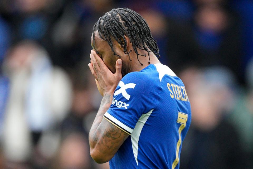 Day to forget: Raheem Sterling was booed by Chelsea fans in the win over Leicester (AP)