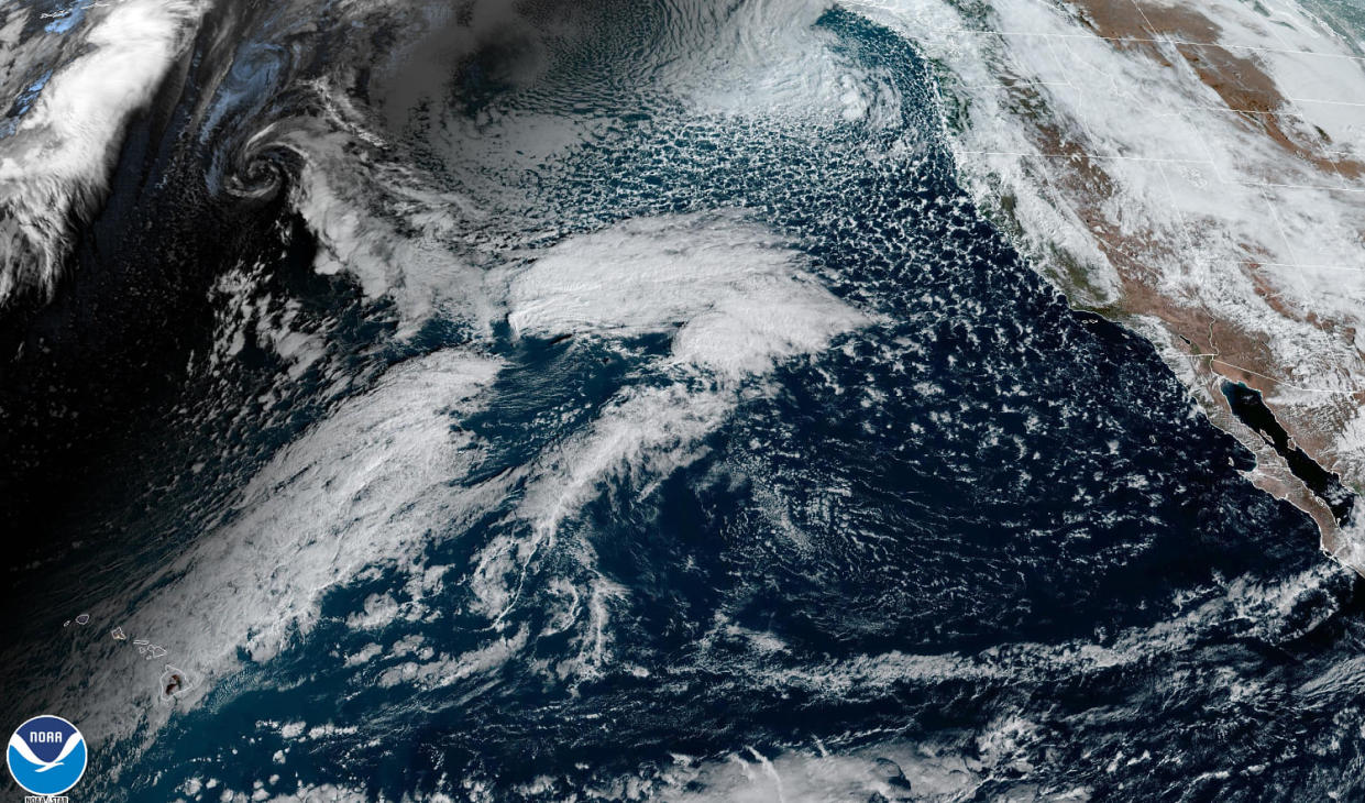 A satellite image of clouds over the Pacific Ocean. (NOAA)