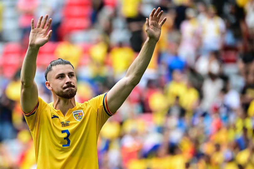 Romania's defender #03 Radu Dragusin acknowledges the public at the end of the UEFA Euro 2024 Group E football match between Romania and Ukraine at the Munich Football Arena in Munich on June 17, 2024.