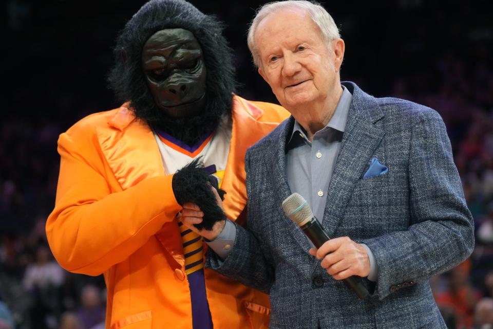 Apr 9, 2023; Phoenix, AZ, USA; Al McCoy is honored for 51 seasons as 'Voice of The Suns' during halftime of their game against the Los Angeles Clippers at Footprint Center.
