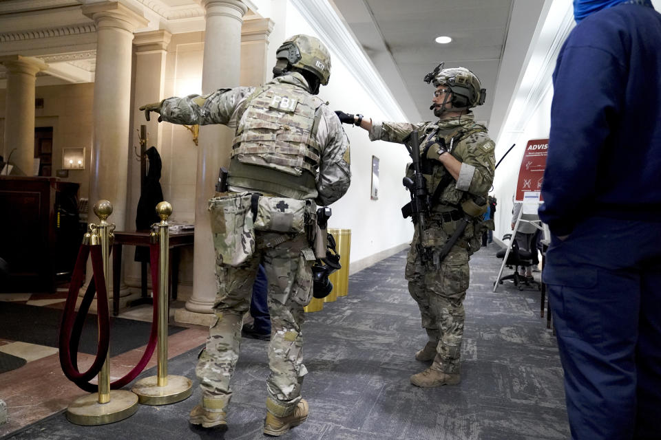 The U.S. Capitol was placed under lockdown and Vice President Mike Pence left the floor of Congress as hundreds of protesters swarmed past barricades surrounding the building where lawmakers were debating Joe Biden's victory in the Electoral College. (Erin Scott / Bloomberg via Getty Images file)