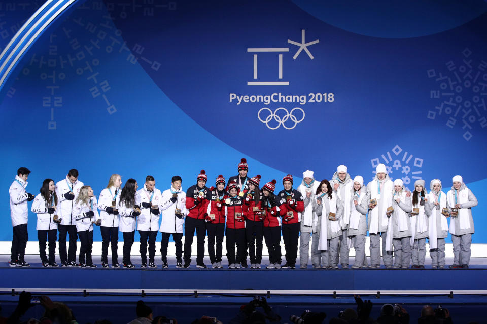 Silver medalists Team Olympic Athlete from Russia, gold medalists Team Canada and bronze medalists Team United States celebrate during the medal ceremony after the Figure Skating Team Event at Medal Plaza on Feb. 12, 2018 in Pyeongchang-gun, South Korea.