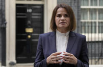Belarus opposition leader Sviatlana Tsikhanouskaya speaks to the media outside 10 Downing Street after a meeting with the British Prime Minister Boris Johnson in London, Tuesday, Aug. 3, 2021. (AP Photo/Alastair Grant)
