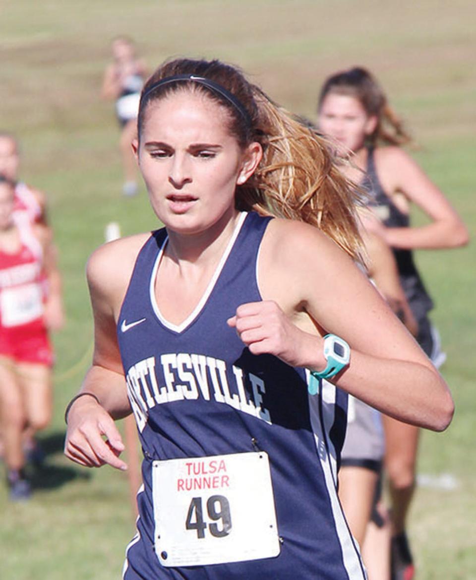 Elena Fries, shown back in her Bartlesville High days, recently competed for Rogers State in the MIAA track championships.