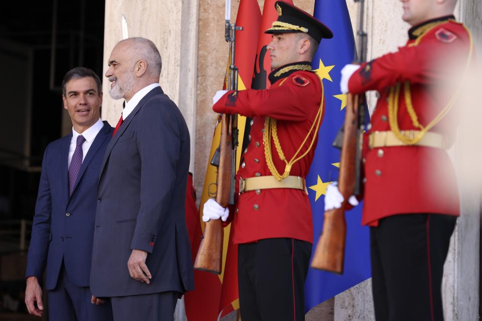 Spain's Prime Minister, Pedro Sanchez, left, and his Albanian counterpart Edi Rama pose for the photographers during the welcoming ceremony at the government headquarters in Tirana, Albania, Monday, Aug. 1, 2022. Sanchez is in Albania for a one-day official visit. (AP Photo/Franc Zhurda)