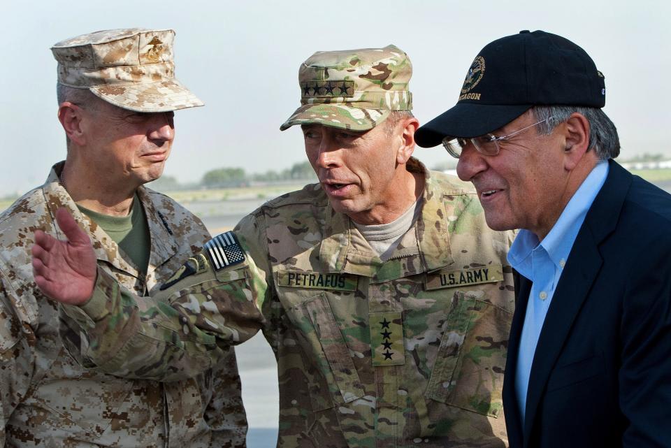 Marine Gen. John Allen, left, and Army Gen. David Petraeus, top U.S. commander in Afghanistan and incoming CIA director, greet Defense Secretary Leon Panetta on July 9, 2011, in Kabul, Afghanistan.