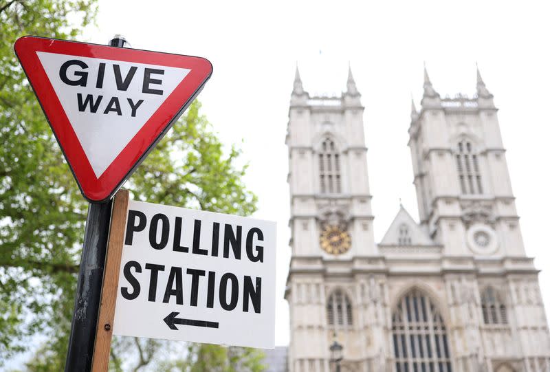 FILE PHOTO: Polling station sign seen ahead of local elections, in London