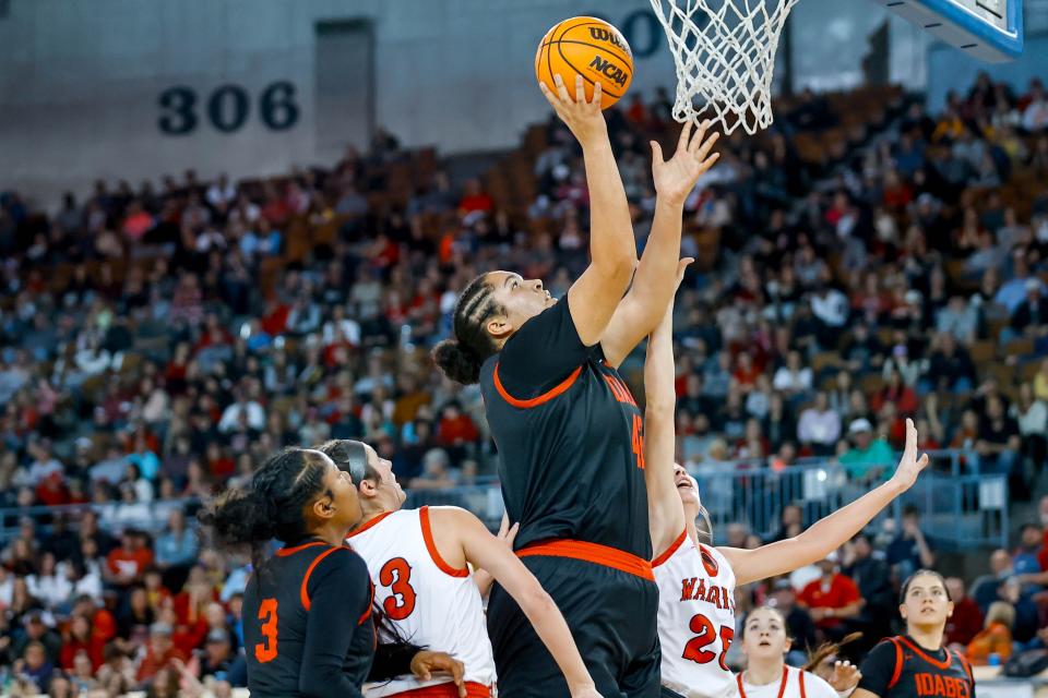 Idabel’s Mary Carden (42) lays up the ball during the championship of the girls state basketball tournament between Washington and Idabel at the Jim Norick Arena in Oklahoma City, on Saturday, March 9, 2024.