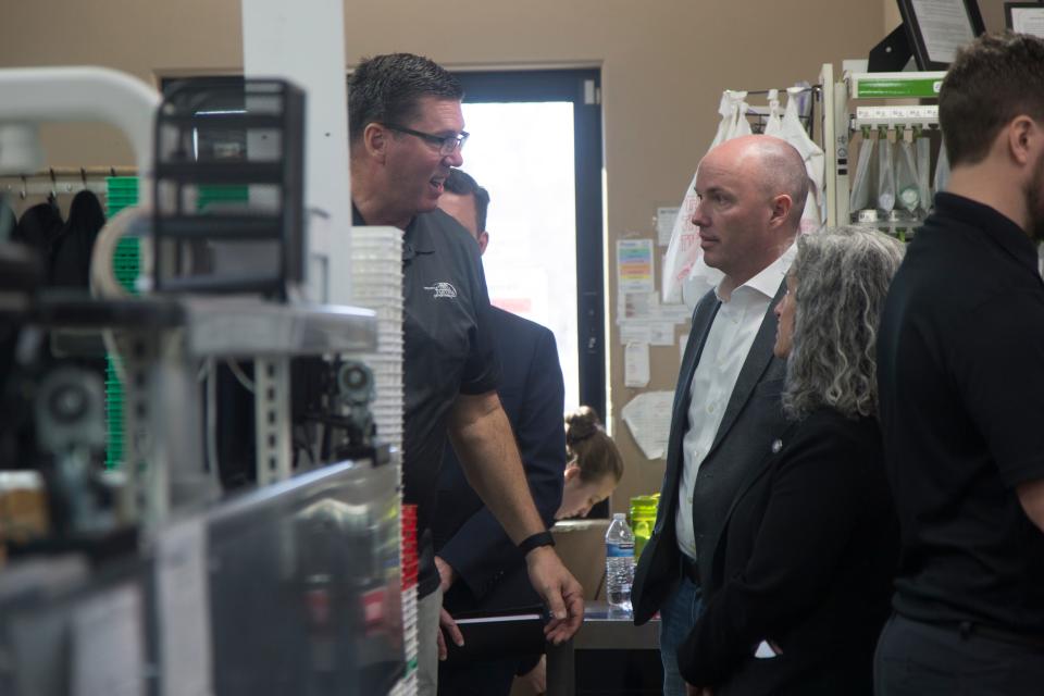 Governor Spencer Cox meets with pharmacists Cliff Holt at Hurricane Family Pharmacy Friday, March 18, 2022. 