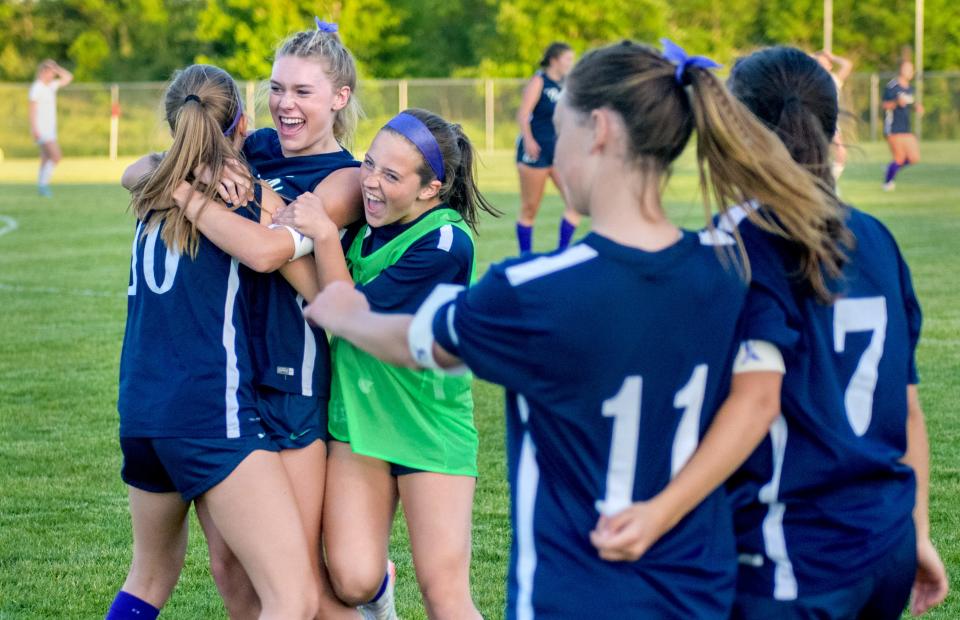 Mya Wardle, facing, and the Peoria Notre Dame Irish celebrate their 4-0 victory over Geneseo in the Class 2A Dunlap Sectional soccer match Friday, May 26, 2023 at Dunlap Middle Valley School. The Irish will face Benet Academy in the Washington Super-Sectional at 6:30 p.m. Tuesday for a berth in the state semifinals.