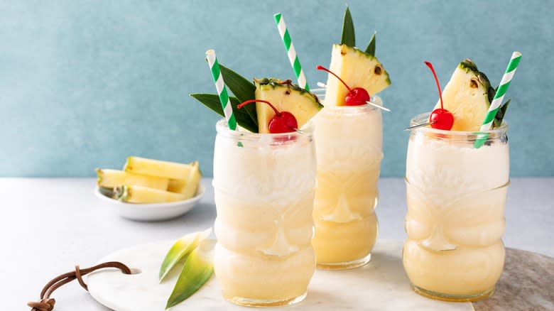 three piña colada cocktails