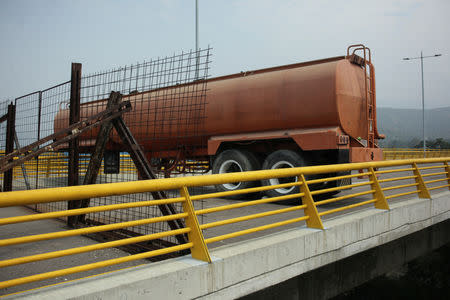 A fuel tank blocks the vehicular passage on Tienditas cross-border bridge between Colombia and Venezuela, in Cucuta, Colombia, February 6, 2019. REUTERS/Carlos Eduardo Ramirez