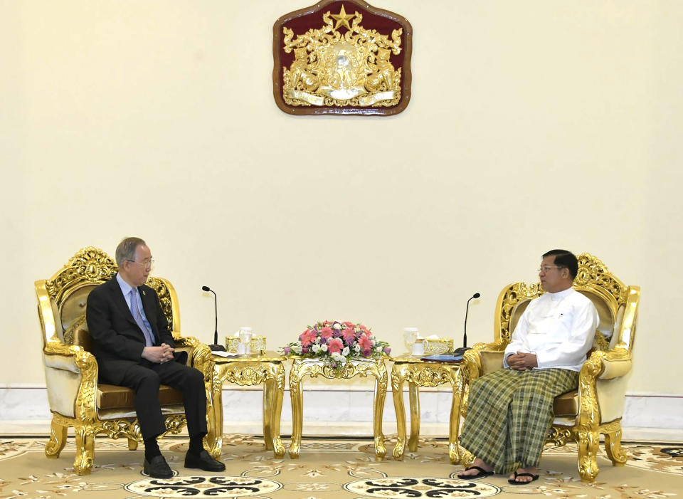 In this photo provided by the Myanmar Military True News Information Team, Senior Gen. Min Aung Hlaing, right, head of the military council, talks with Ban Ki Moon, left, former U.N Secretary-General, during their meeting Monday, April 24, 2023, in Naypyitaw, Myanmar. (Military True News Information Team via AP)