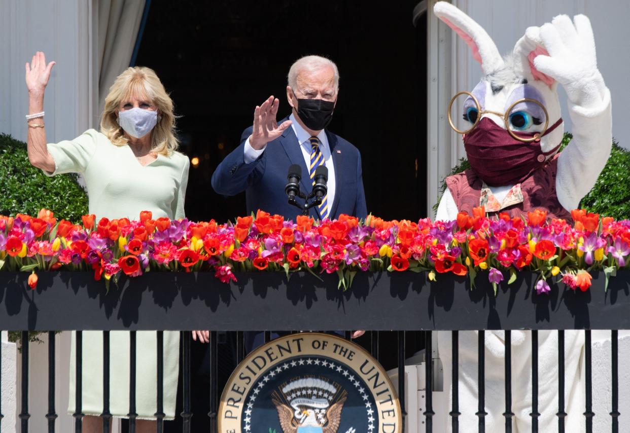 President Joe Biden, alongside First Lady Jill Biden (L) and the Easter Bunny (R), speaks about the Easter holiday and the traditional White House Easter Egg roll, which was not held this year because of coronavirus, on the South Lawn of the White House in Washington, DC on April 5, 2021.