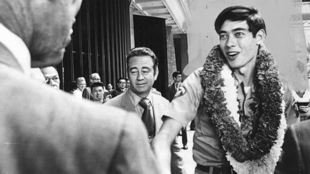 PHOTO: Spc. 5 Dennis Fujii returns home to Hawaii from Vietnam with a hero’s welcome in 1971. (Courtesy Fujii family)